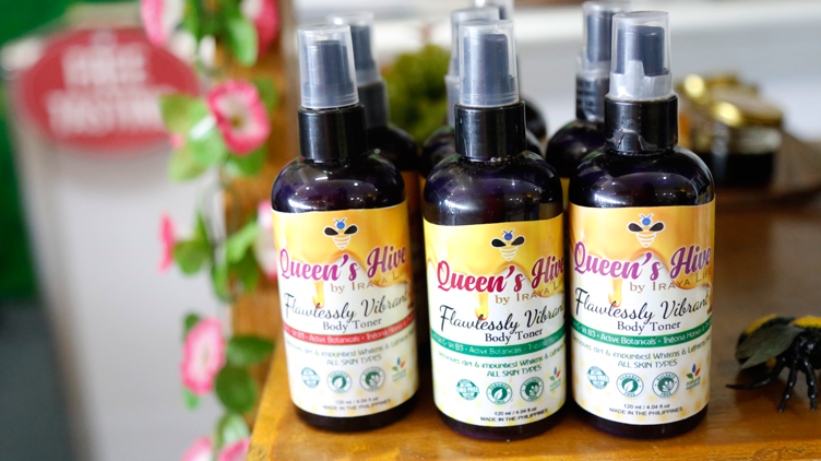 Bottles of Queen's Hive body toner
