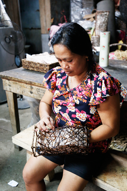 RLM Products employee working on a lamp