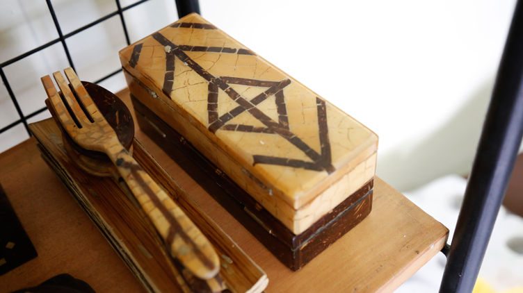 Spoon, fork, and a box made from laminated coconut shells