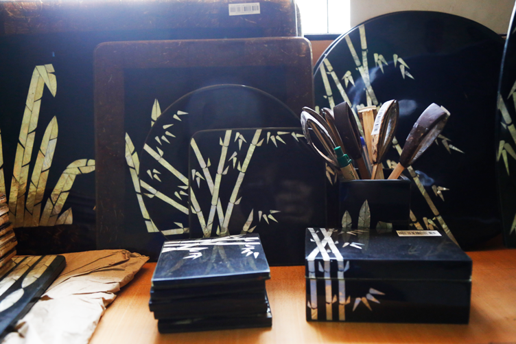 Boxes, frames, and pencil holders made from laminated coconut shells