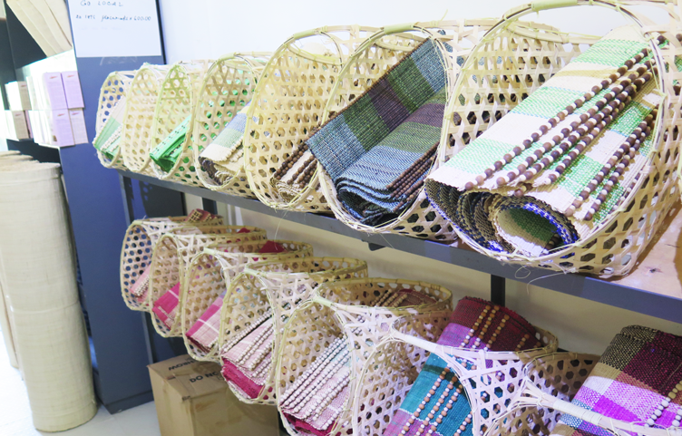 Various hand-loomed placemats for sale at TLMPC's store