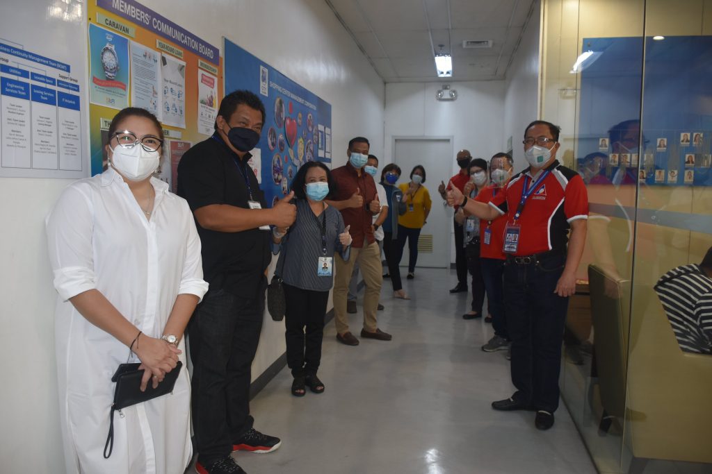 People showing a thumbs up.