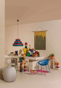 A photo of another mock set up featuring several colorful pieces available at the digital fair