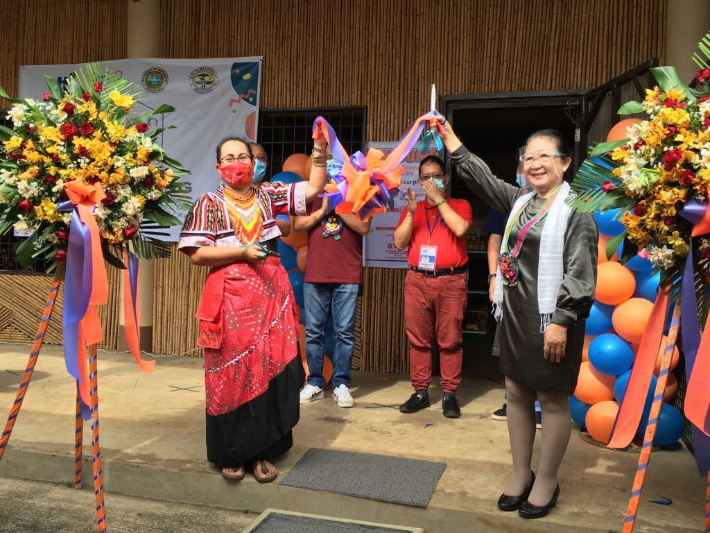 DTI 10 Regional Director Linda Boniao graces the launching of OTOP Hub Malaybalay with Lorielinda Bella Marte of the Tagolwanen Women Weavers Association (TWWA) Enteprise, the cooperator of the pasalubong center.