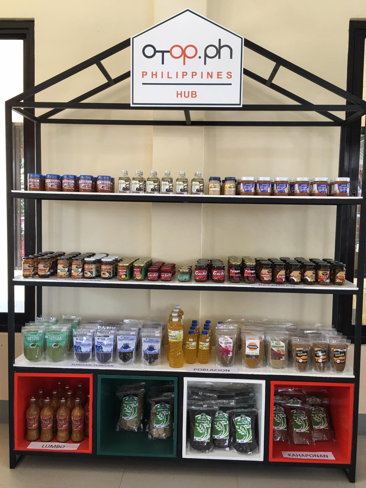 Processed food products are neatly arranged in the OTOP Hub Valencia.