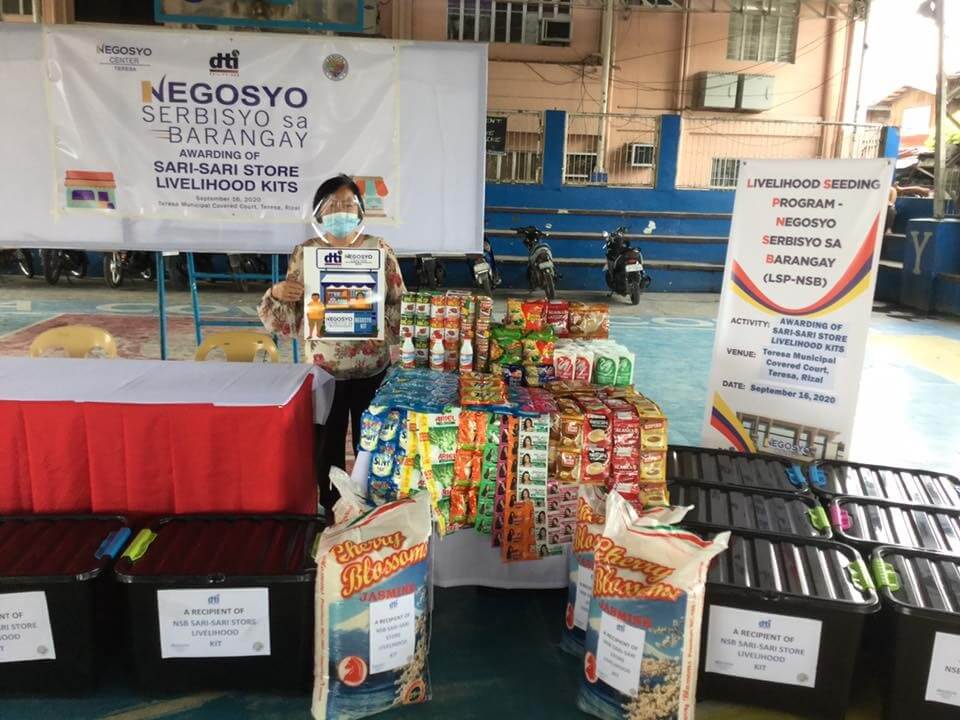 Provincial Director Mercedes A. Parreño presenting the Sari-sari Store Livelihood kit given for each beneficiary of LSP-NSB Program