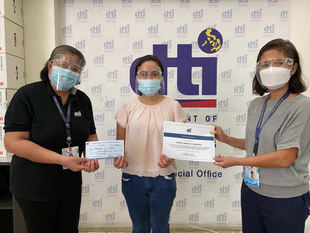 Ms. Chancel Dorothy Francisco receives her certificate upon completion of the training program