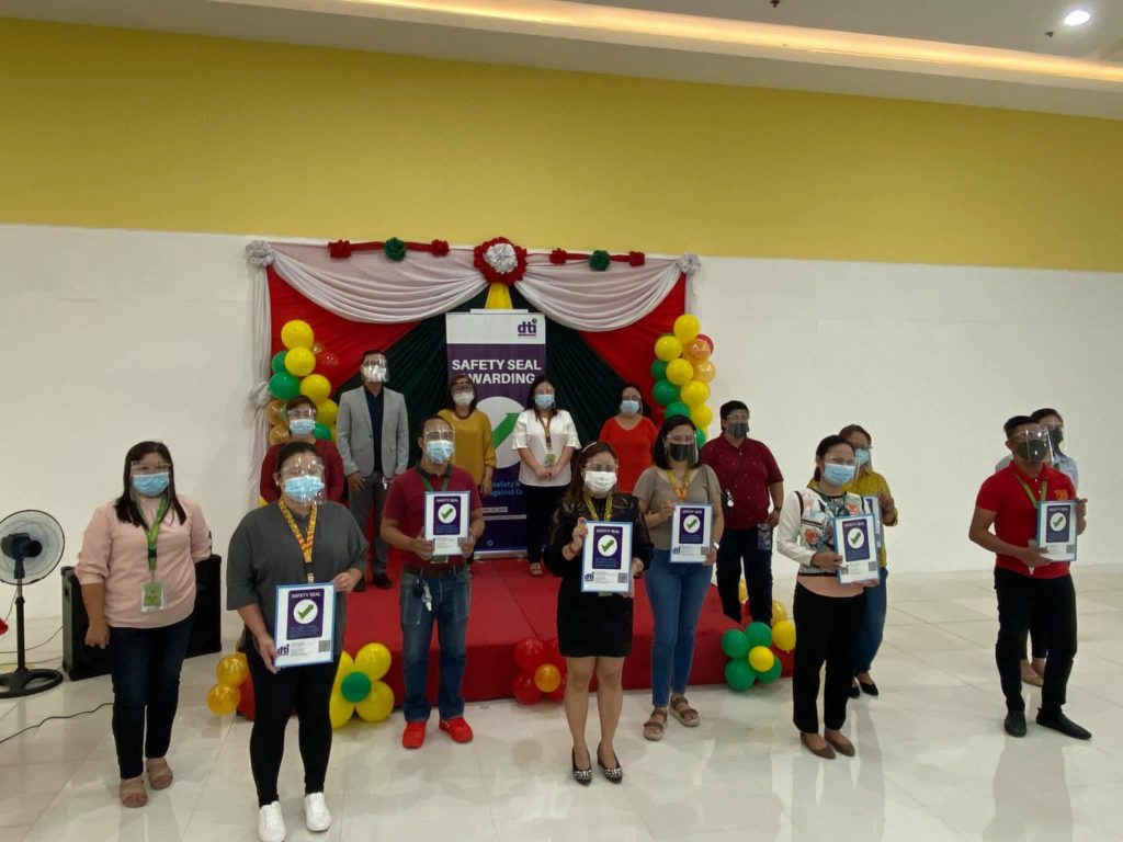 DTI-4A awarding the safety seal certification to 7 Puregold branches