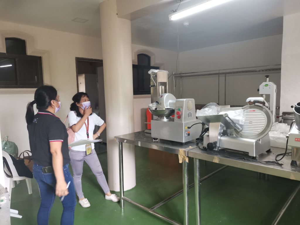 in photo: DOST-DTI-LGU team inspecting KALIPI-RIC processing building