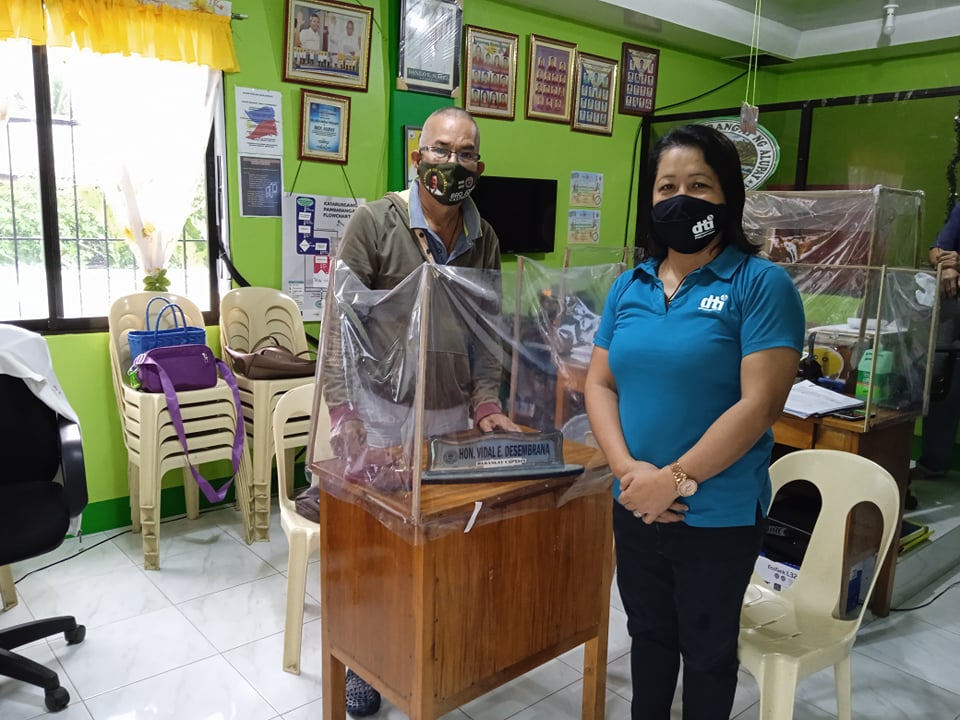 in photo: Barangay Captain Vidal E. Desembrana together with Negosyo Center Business Counsellor