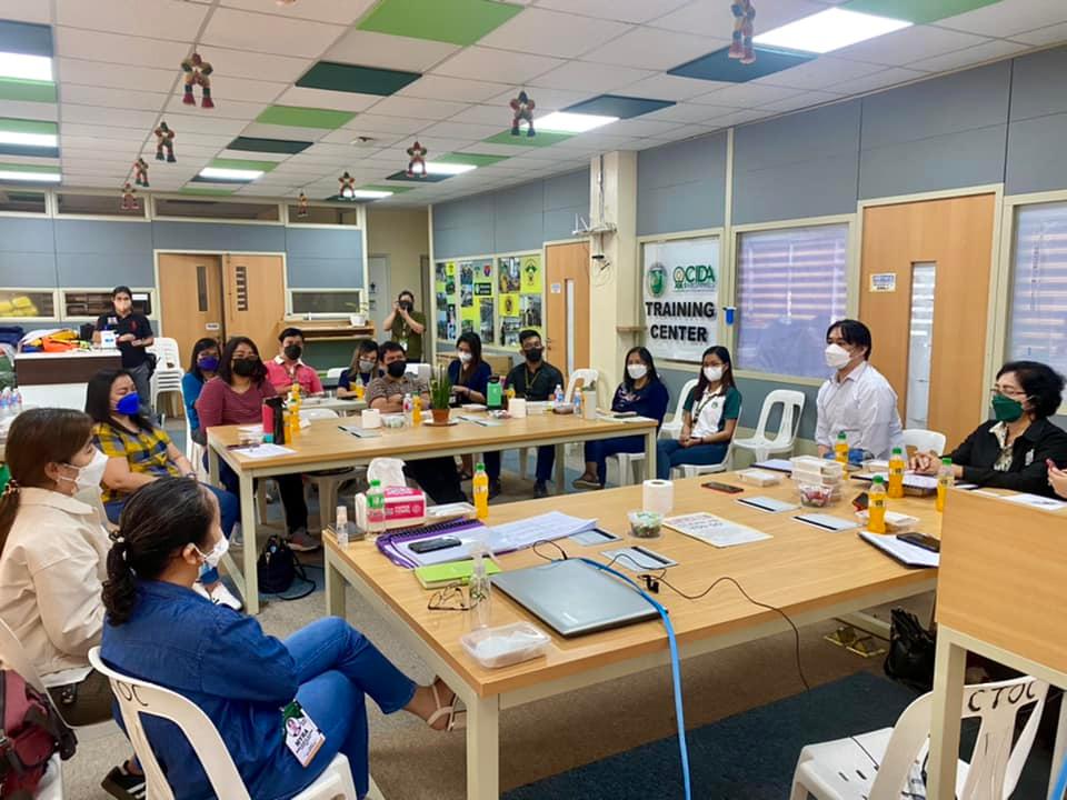 in photo: participants of Laguna Business Code in a group discussion