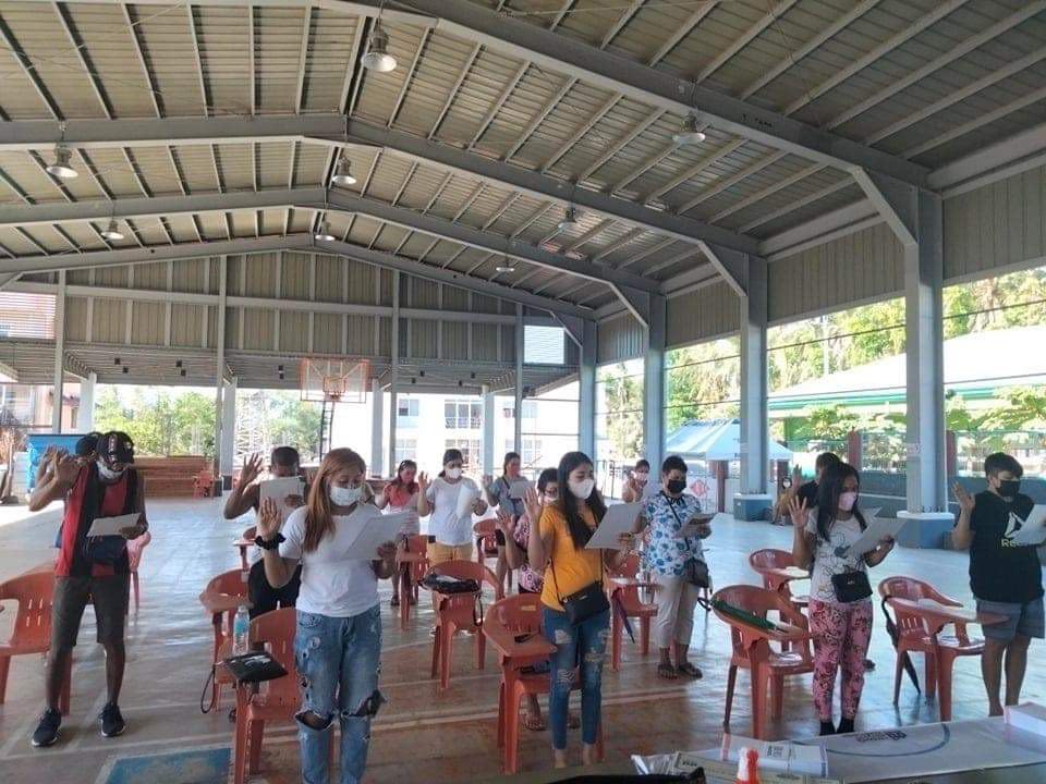 in photo: LSP-NSB beneficiaries taking their Pledge of Commitment