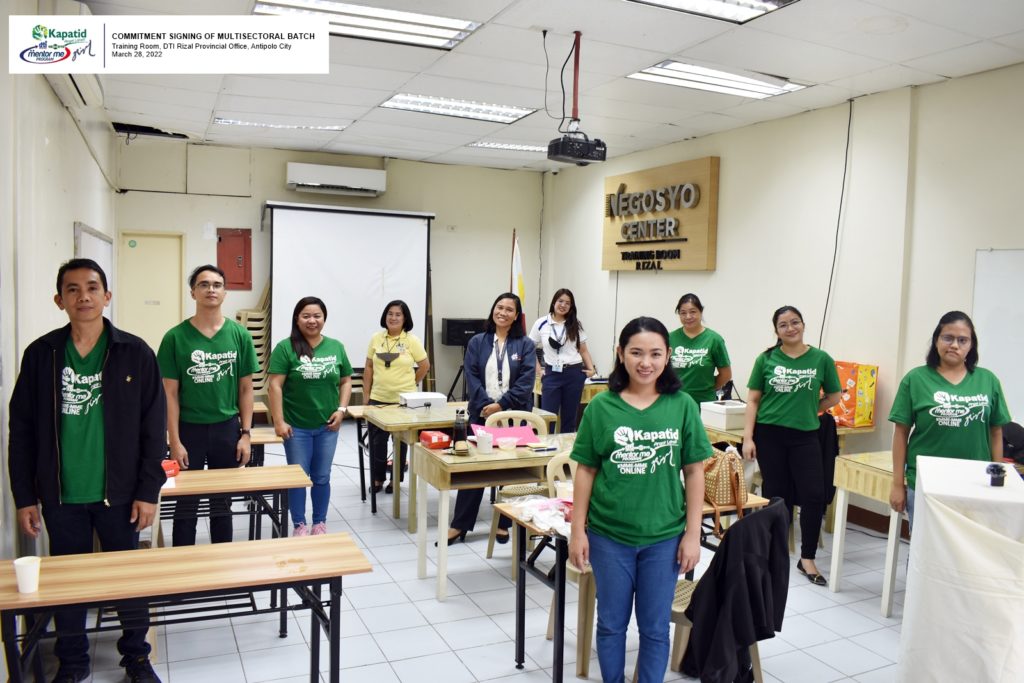 Group picture of the attendees of ceremonial contract signing.