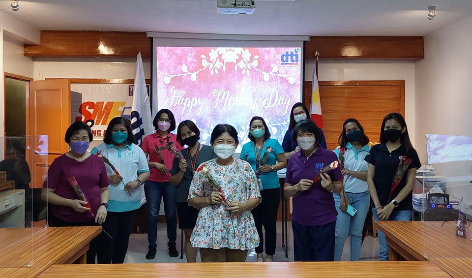 In Photo: 13 mothers in the office at DTI Quezon