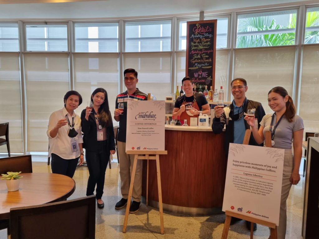 Mr. Michael Harris Lim together with PD Clarke Nebrao of DTI Laguna in his coffee shop