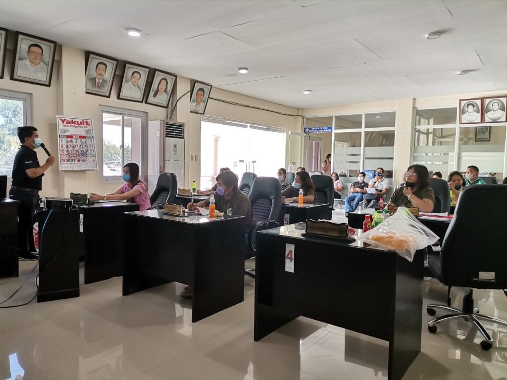 In photo: Accounts Management Analyst II Kevin Laroza discussing the P3 Program Wholesale Lending Loan features