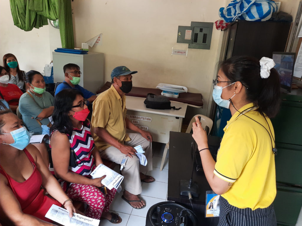 Negosyo Center Tiaong Business Counselor Zara H. Capina explaining the DTI programs and services