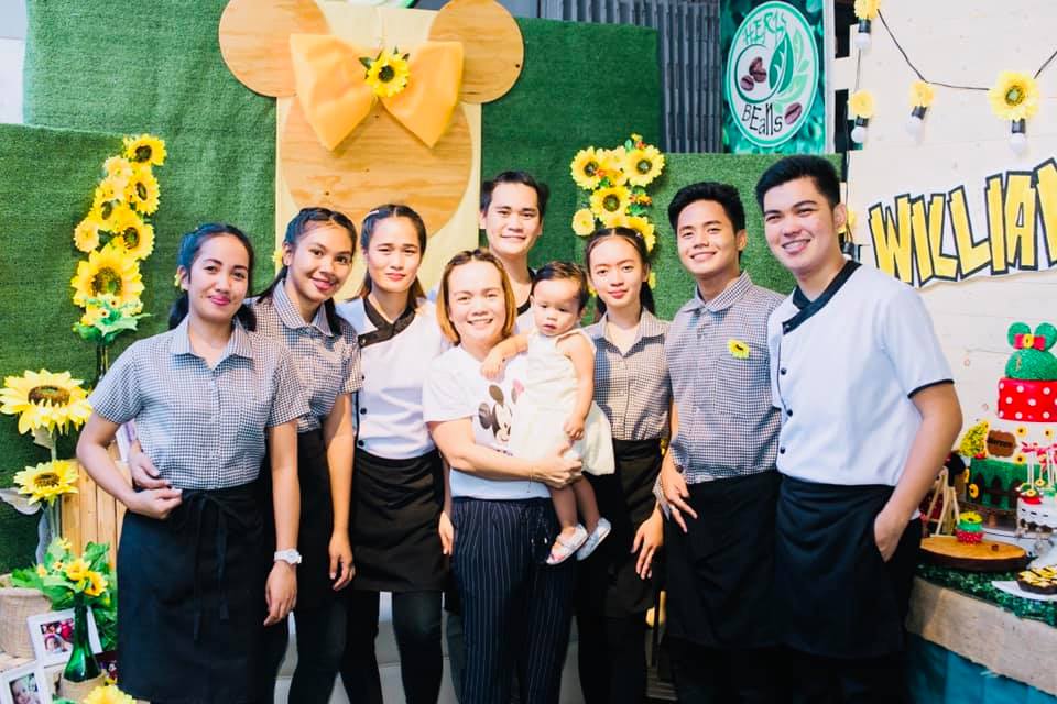 Triwil Herbs and Beans Café employees together with its owners.