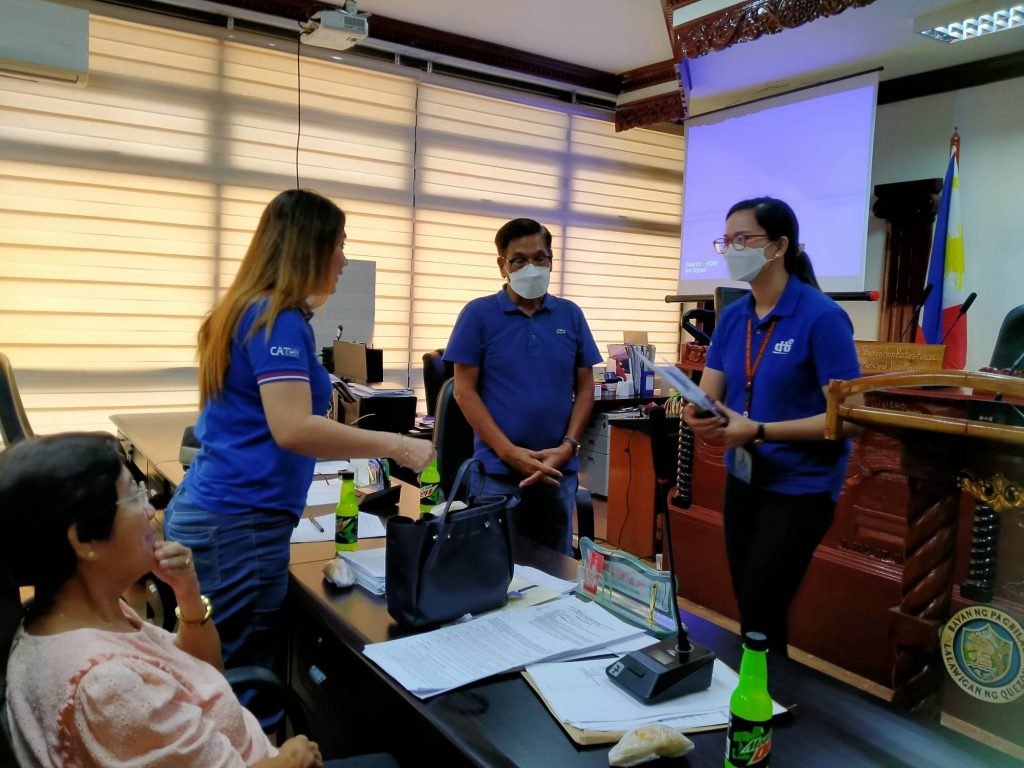 in photo: DTI Quezon TIDS/BLAP Focal Person, Ms. Jaryz Eden Lloce, took part in a public hearing.