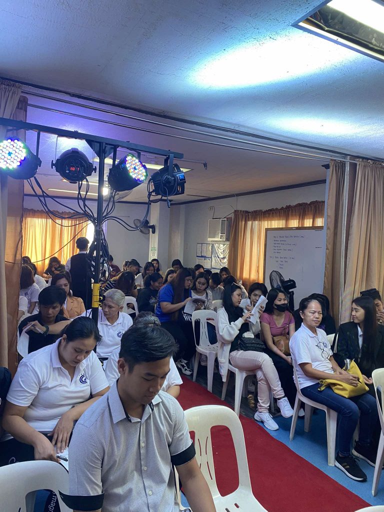 A group of people attending a seminar.