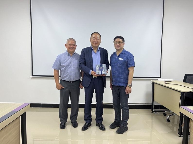 From L-R: PTIC Beijing Commercial Counsellor Glenn Peñaranda; Aice Philippines Ice Cream Incorporated Vice President Simon Yang; FTSC Executive Director Emman Ang posing for a photo.