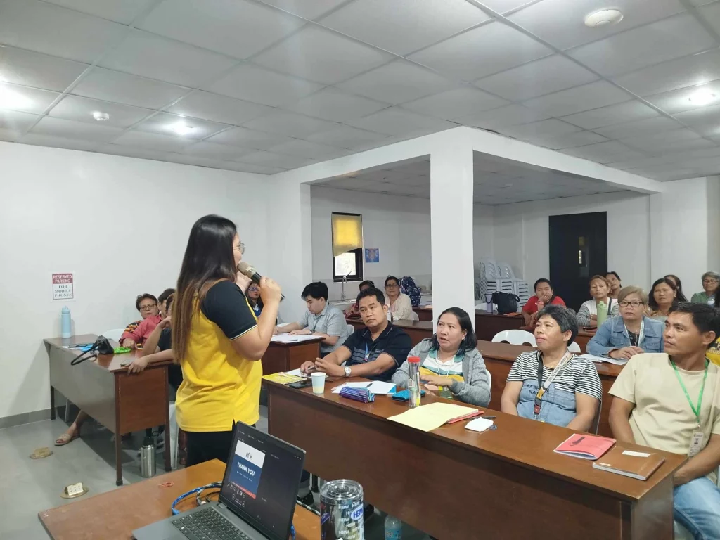 In photo: A DTI resource person speaks to micro-entrepreneurs during a livelihood training session on business compliance and the 6S methodology in Bay, Laguna.