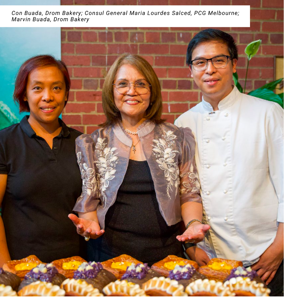 Con Buada of Drom Bakery, Consul General Maria Lourdes Salcedo of PCG Melbourne, and Marvid Buada of Drom Bakery posing for a photo during the event