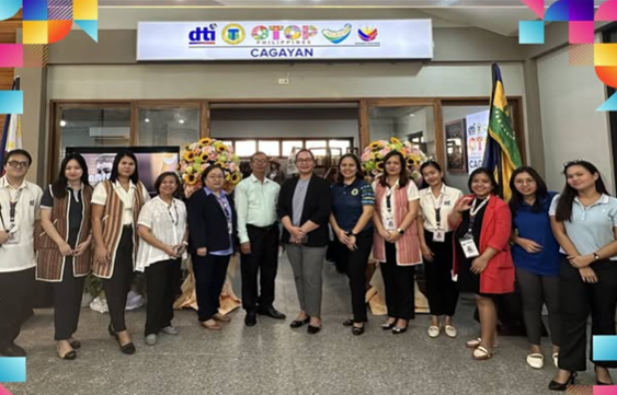 DTI opens OTOP Philippines Store in Cagayan. Group photo of staff and officials in front of the store.