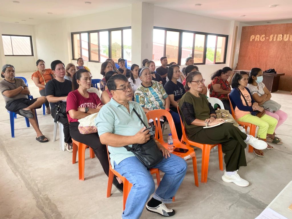 Luisiana MSME participants are seated and attentively listening during a session of the DTI-Laguna seminar on "Financial Opportunities for MSMEs: DTI-SBCorp Loan Programs & Consumer Education."