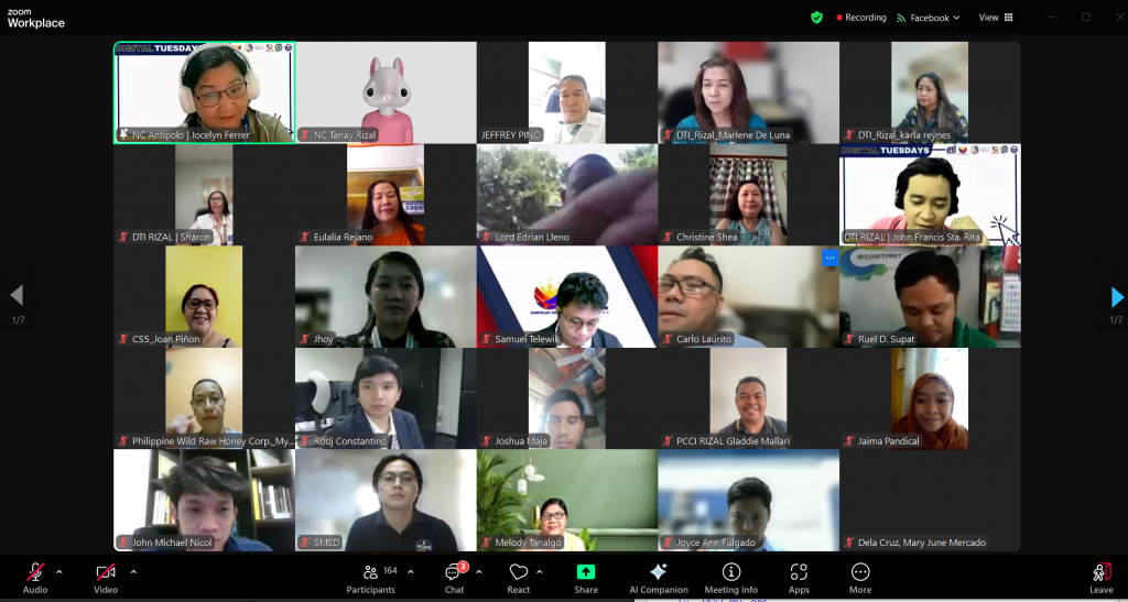 A screenshot of a video conference call showing multiple participants in a grid layout. Some text is visible, including names and affiliations of the participants, as well as the platform's interface with controls for audio, video, chat, and other functions.