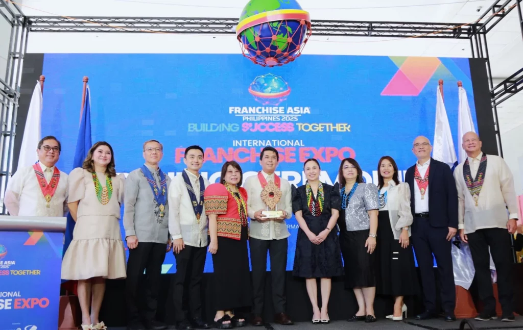 DTI Secretary Cristina Roque with officials and guests during the opening ceremony of the International Franchise Expo at Franchise Asia Philippines 2025 in Pasay City.