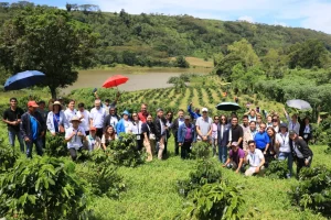 IFAD Associate Vice President Donal Brown and DTI officials visit coffee farming communities in Bukidnon, Philippines, highlighting the impact of the RAPID Growth Project’s infrastructure and agro-enterprise support on local farmers and youth engagement.