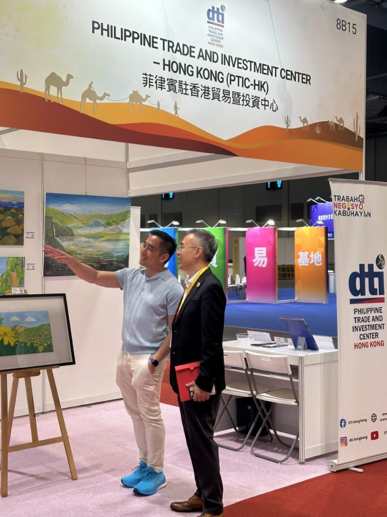 Atty. Mabalot introduced the paintings to the visitor.