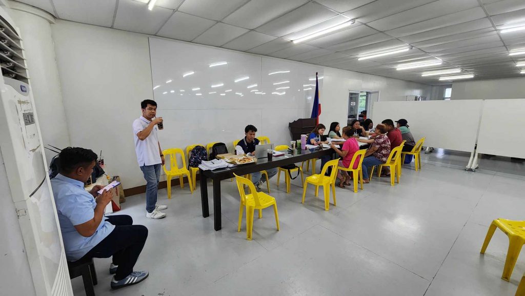 DTI-Laguna staff and micro-entrepreneurs participate in the Pangkabuhayan sa Pagbangon at Ginhawa (PPG) validation activity held on June 17, 2025, at the Santa Cruz Municipal Building to assess fire-affected MSMEs for livelihood support.