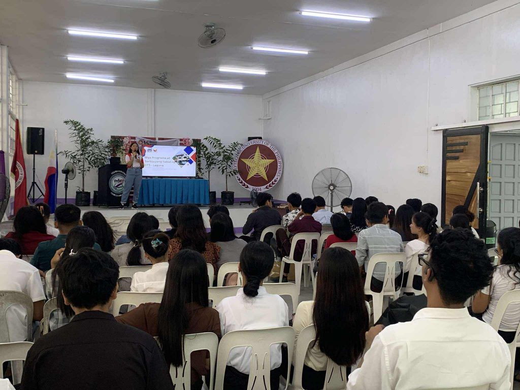 DTI-Laguna representatives presenting entrepreneurship programs to graduating students during the PUP-Calauan career deployment forum, highlighting support services like YEP, Negosyo Center, and SMERA.