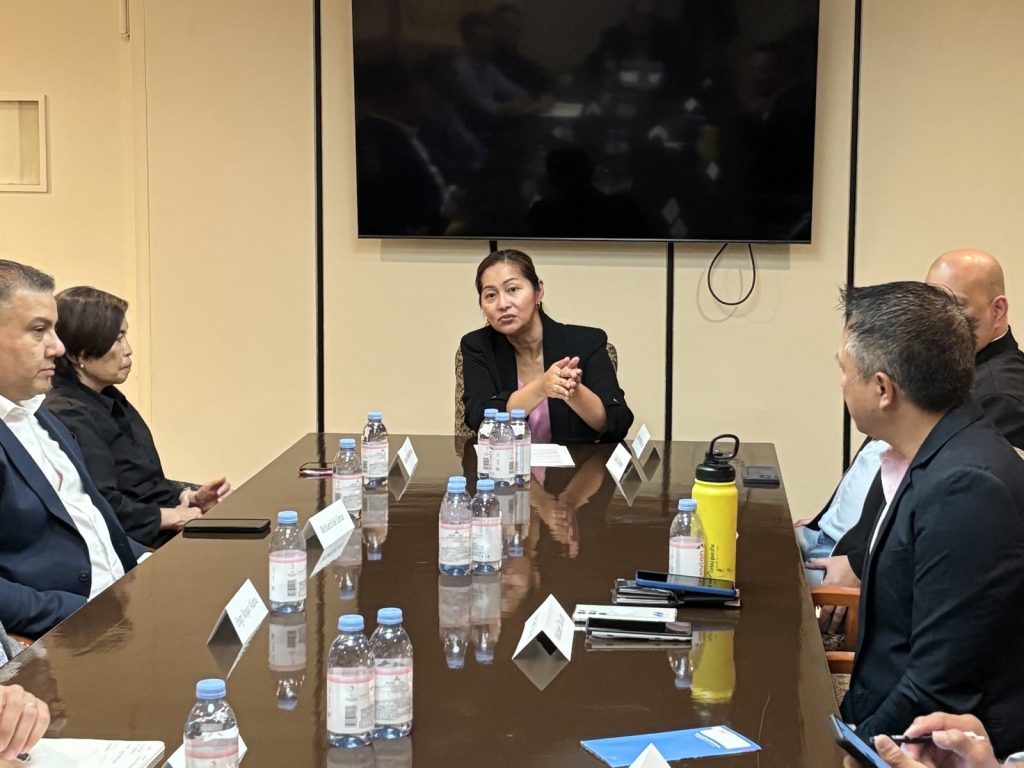 Participants seated around a conference table during the ICT Roundtable hosted by PTIC-NY at the Philippine Center in New York, discussing STEM education, ICT expansion, and digital inclusion.